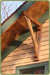 A picture showing alaskan yellow cedar shingles in weathered and natural colors.