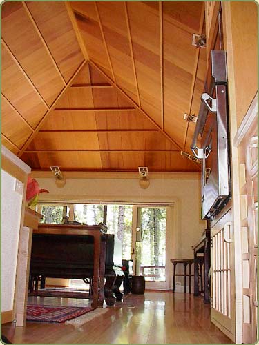 wide western red cedar ceiling paneling, also shown are yellow cedar beams