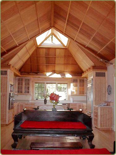 wide western red cedar ceiling paneling, also shown are yellow cedar beams