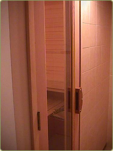 a sauna with alaskan yellow cedar paneling