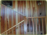 small image of stairs and redwood wall paneling