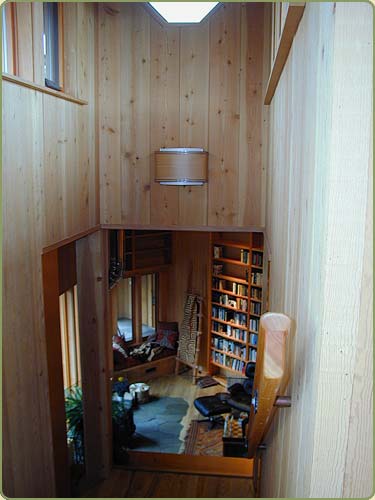 Image of the stairs with fir paneling