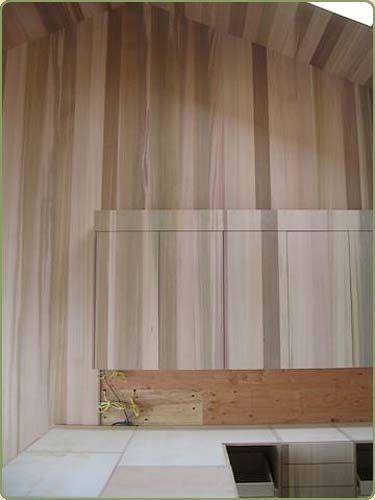 wall and cabinets match their grain pattern