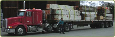 Our driver mark arriving with a load of 50.000 board feet of reclaimed lumber to be milled.