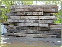 image of a unit of reclaimed lumber waiting to be milled into new products