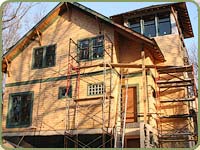 image of yellow cedar shingles being installed