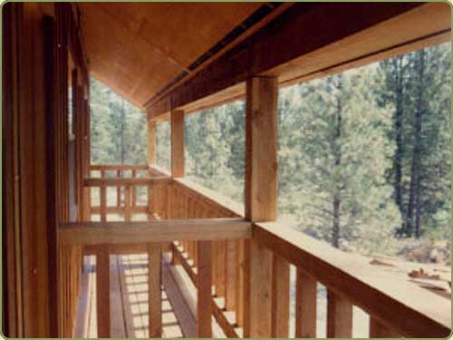 image of western red cedar soffit, also shown is red cedar beams and railing.