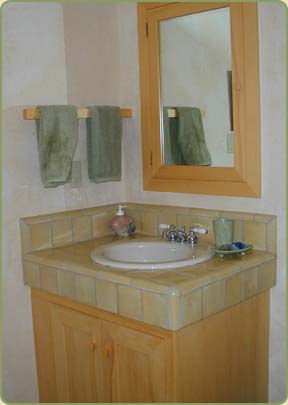 Image of alaskan yellow cedar trim around mirror and boards for cabinets