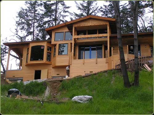 large image of the owens home depicting large POC timbers