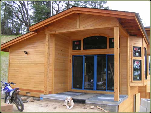 large view of the entry with cedar siding