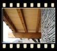 detail of the garage doors, trim and shingles